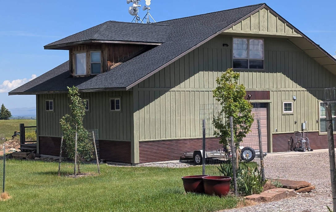 Meridian Roofing Services team serving Gallatin Gateway Montana homes beneath mountain peaks